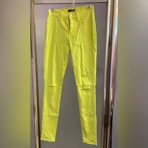 NWOT Fashion Nova fluorescent yellow skinny jeans Size 7 with ripped knee accent